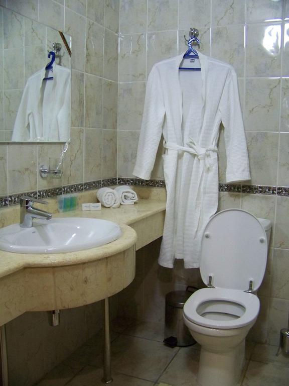 Sky Luxe Hotel Astana Værelse billede